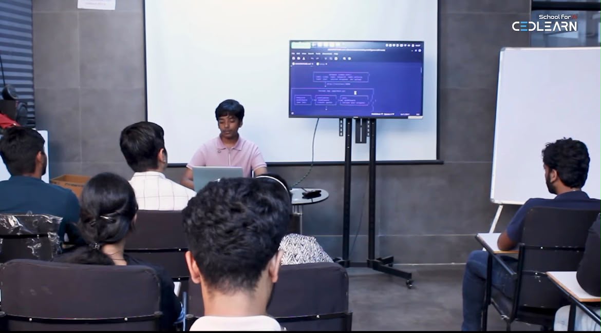 rajdeep giving a guest lecture to a room of students